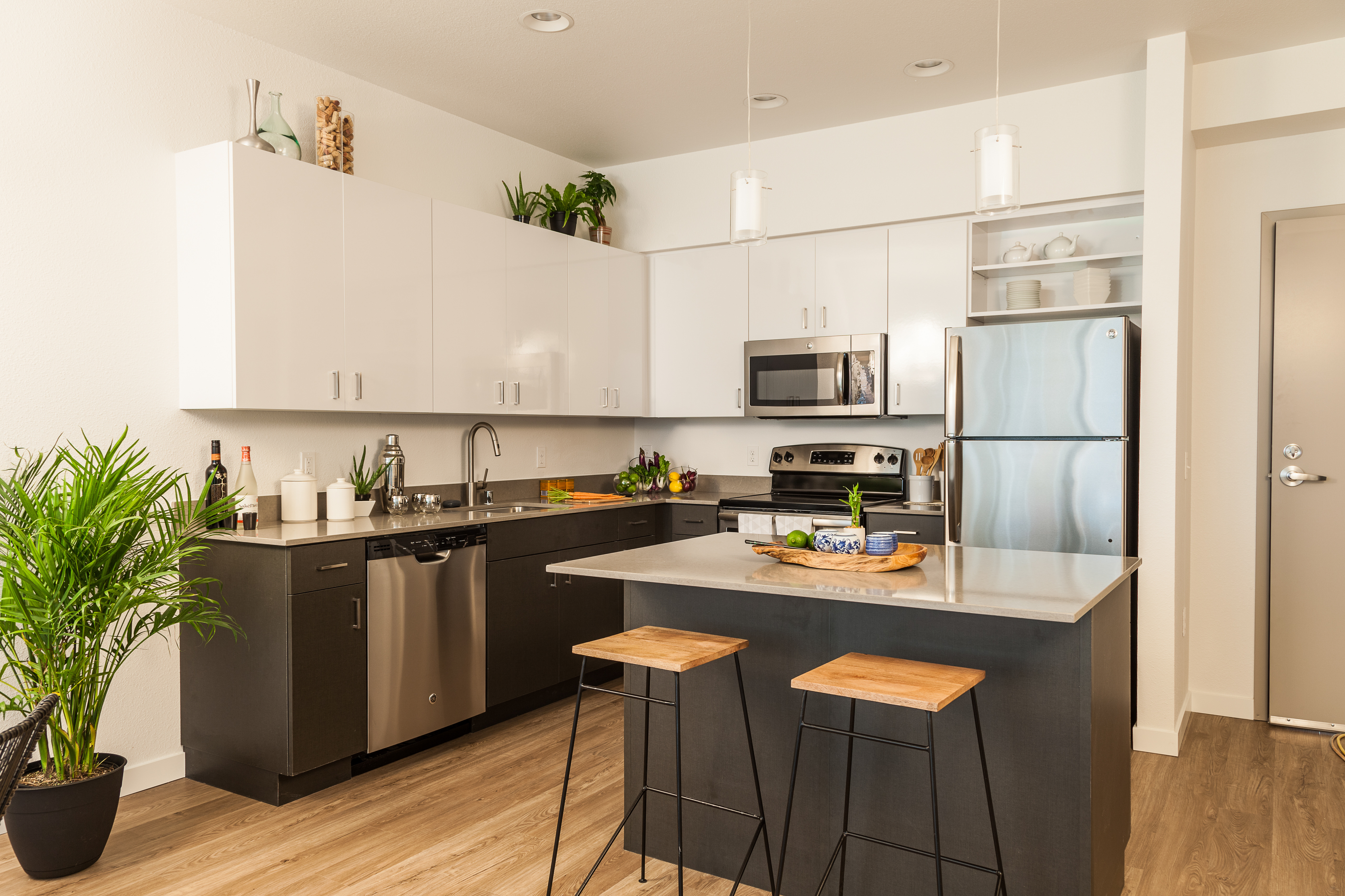 Remodeled kitchen with cabinetry and island seating
